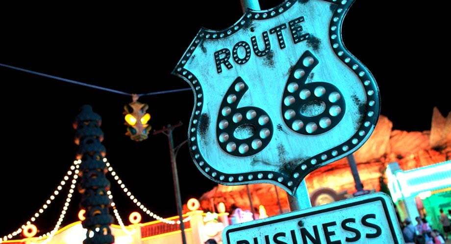 old route 66 sign against a carnival background