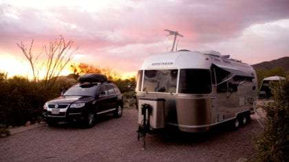 a Volkswagen Toureg hitched to an Airstream