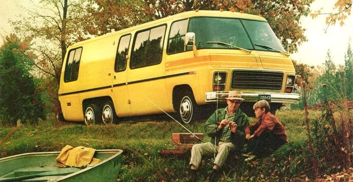 advertisement photo from a magazine showing a bright yellow motorhome, a father and son fish in the foreground