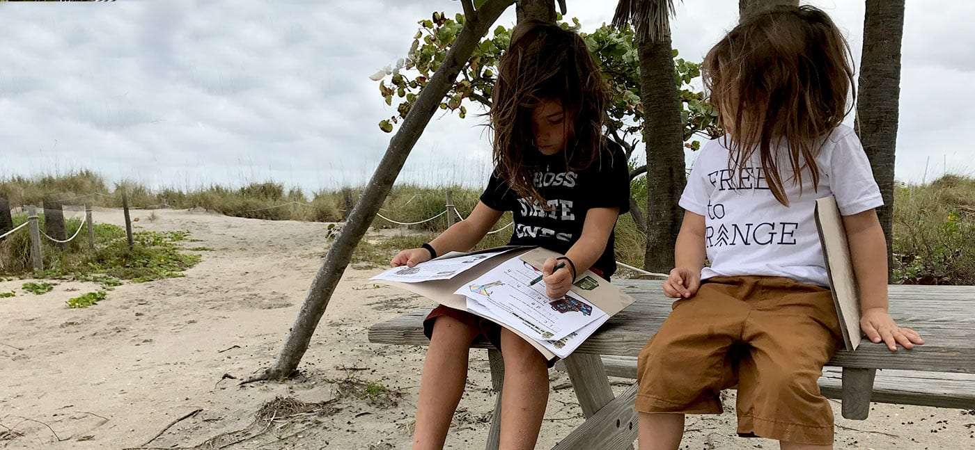 two young boys working on junior ranger badges in Florida