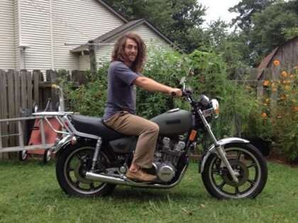 Aaron on his motorcycle in their yard in Virginia