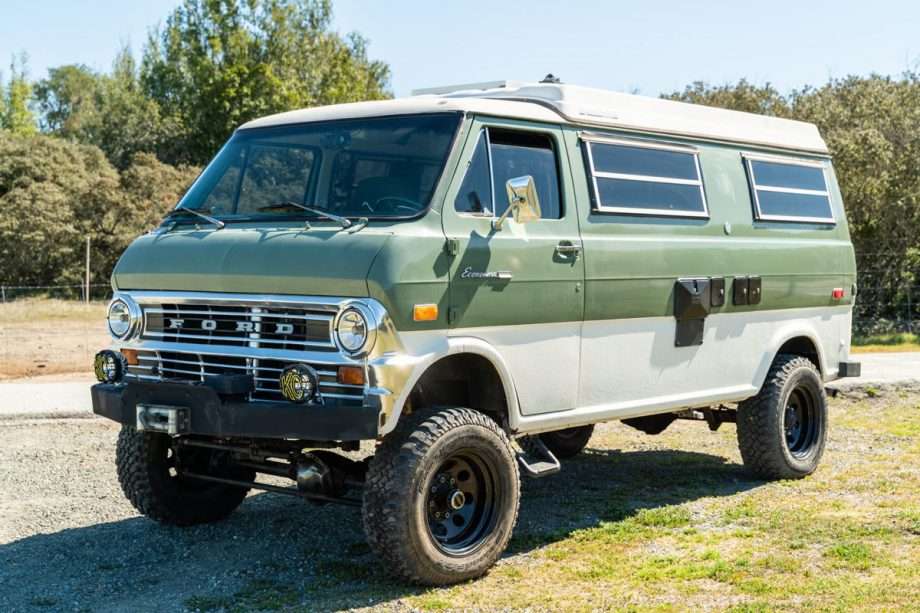 a two-toned green and white sportsmobile from the 1970s